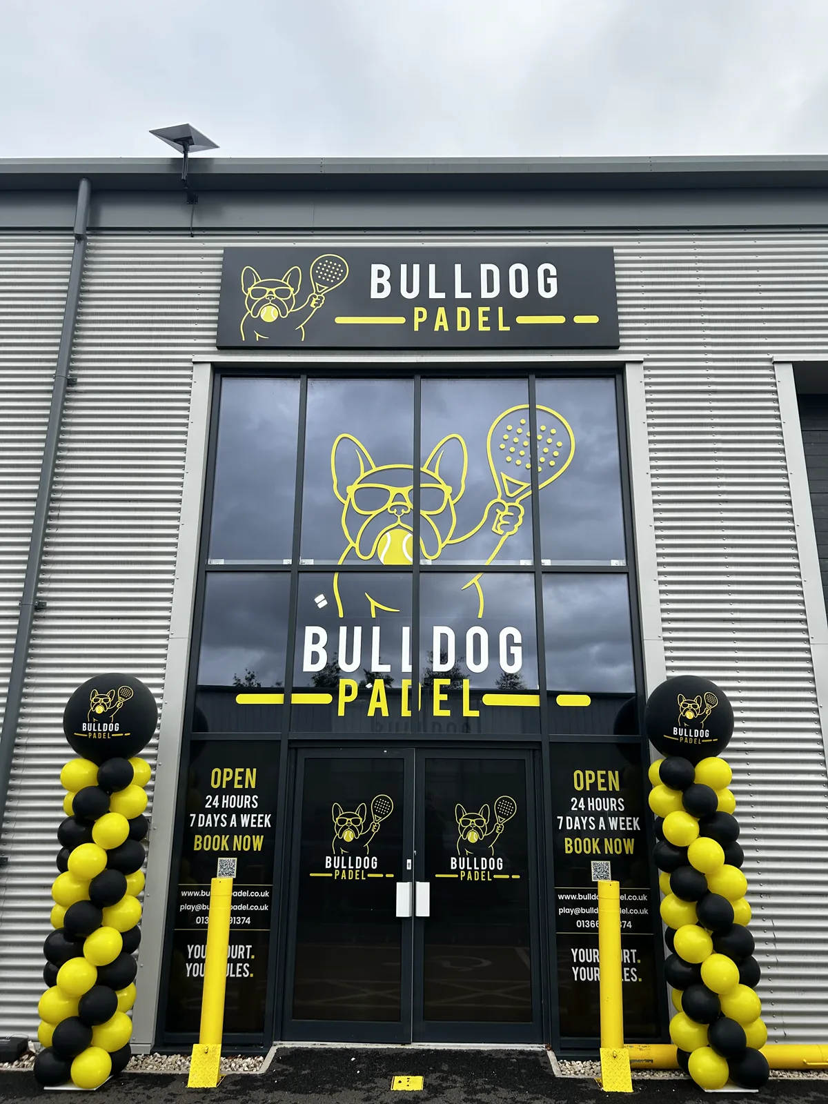Friends playing padel together at the Bulldog Padel launch